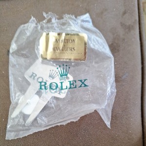 Not used, but opened with tees removed. Authentic Rolex 1 Marker 1 Divot Tool