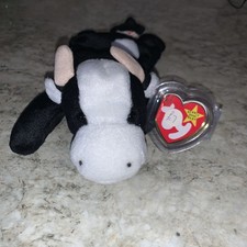 BNWT Retired Ty Beanie Baby Plush Daisy the Cow Black White Immaculate SKU 5