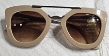 Light Weight Cat Eyed Sunglasses In A Beige Color