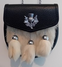 BLACK LEATHER WHITE FUR SPORRAN.GOOD CLEAN CONDITION.UNUSED.