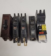 15 AMP CIRCUIT BREAKERS. LOT OF 6. SEE PHOTOS.