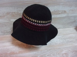 black rimmed hat