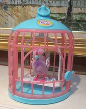 Little Live Pets Interactive Talking Bird in Bird Cage Parakeet Toy Wings Light
