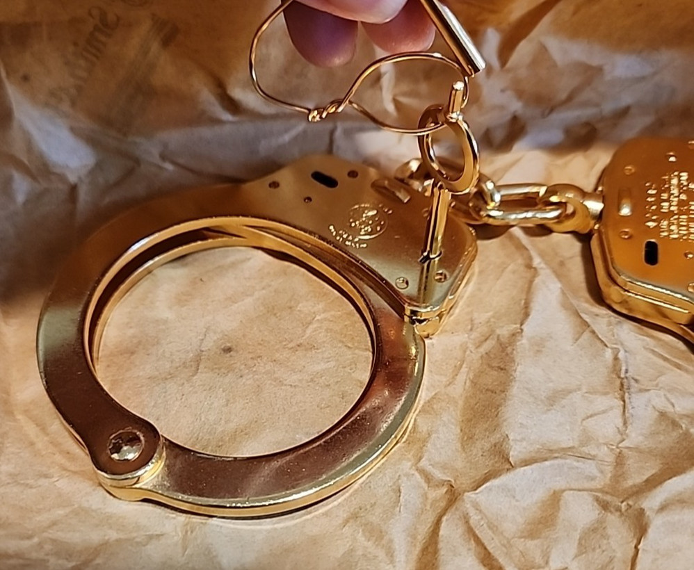 New in Box! Smith and Wesson Model 100 24kt Gold Plated Handcuffs