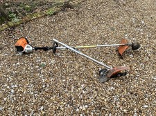 Stihl Km131r with strimmer & lawn edger attachments
