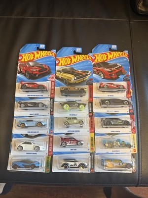 15 Hot Wheels NEW. 3 Red Line Cars Included. 2026 C Case