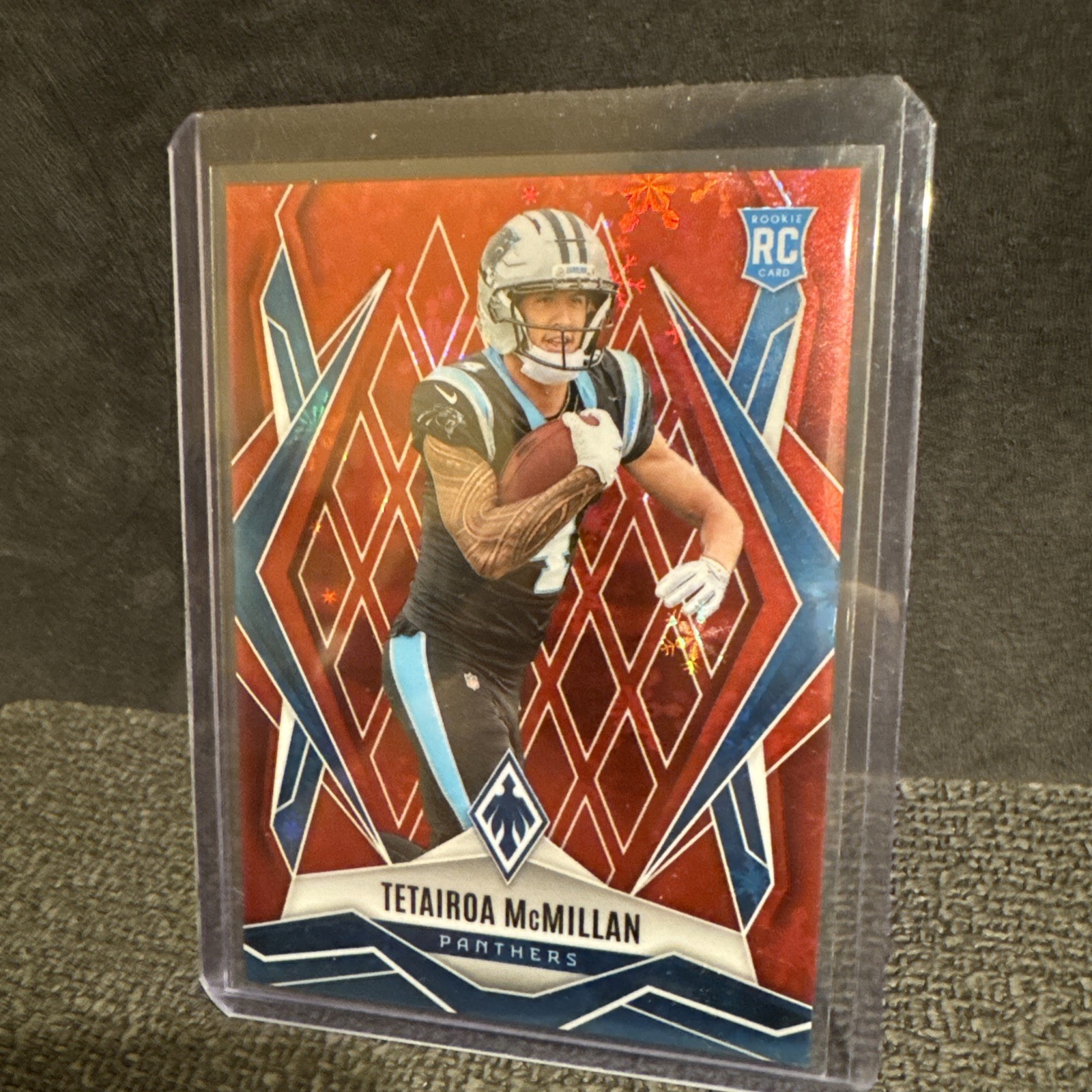 2025 Panini Phoenix #155 Tetairoa McMillan Red Winter Prizm #/399