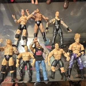 WWE 8pc Wrestling Action Figures Mixed Lot The Rock Undertaker Stone Cold
