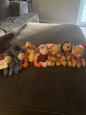 Lot of 7 Disney Store Winnie the Pooh Mini Bean Bag Plush.