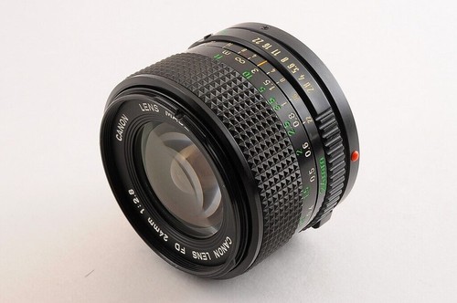 【CASI COMO NUEVO+】CANON NEW FD NFD 24mm F/2.8 MF Lens Cap + 1984 OLYMPIC... - Imagen 3 de 12