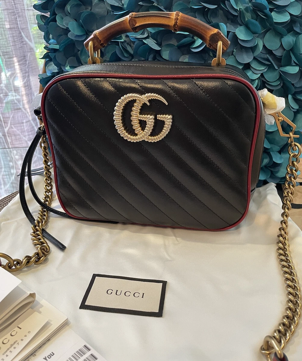 GG matelassé top handle mini bag