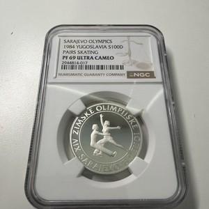 1984 Yugoslavia 100 Dinara Sarajevo Olympics Pairs Skating NGC PF69 Ultra Cameo