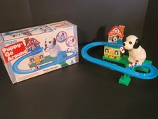 TESTED GOOD 1970s Blue Box Toplay Japan Puppy Go Round Battery Operated