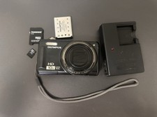 Olympus D-720 14.0MP Compact Digital Camera B...