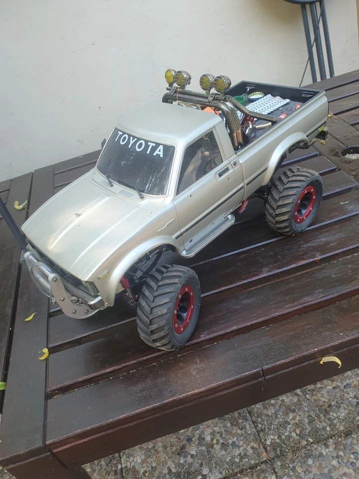 Tamiya 58397 1:10 RC Toyota HiLux HighLift 4x4 3 Gang 300058397 - Bild 2 von 4