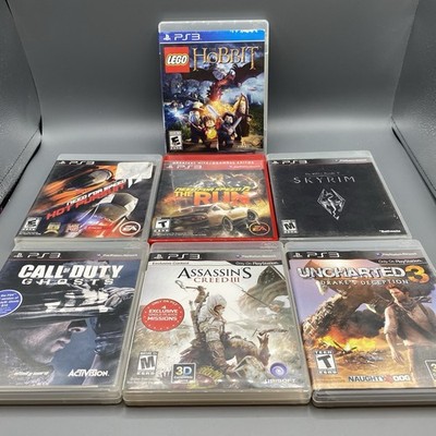 PS3 Assorted Game Lot of 7 Lego Hobbit/Skyrim/Need For Speed/COD/Assassins Creed