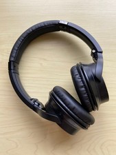 Audio Technica black wired over-ear headphones