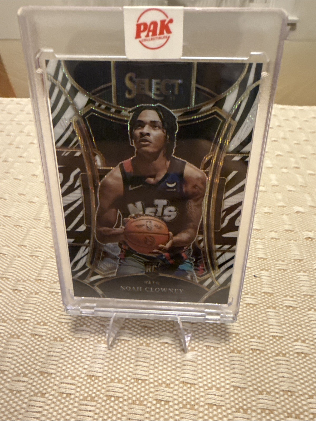 2023-24 Panini Select - Mezzanine Level Noah Clowney #325 Zebra Prizm (RC)