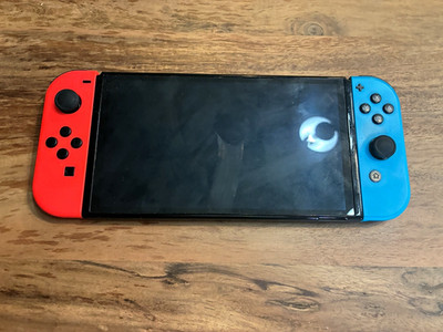 Nintendo Switch OLED with Joy Cons and Dock
