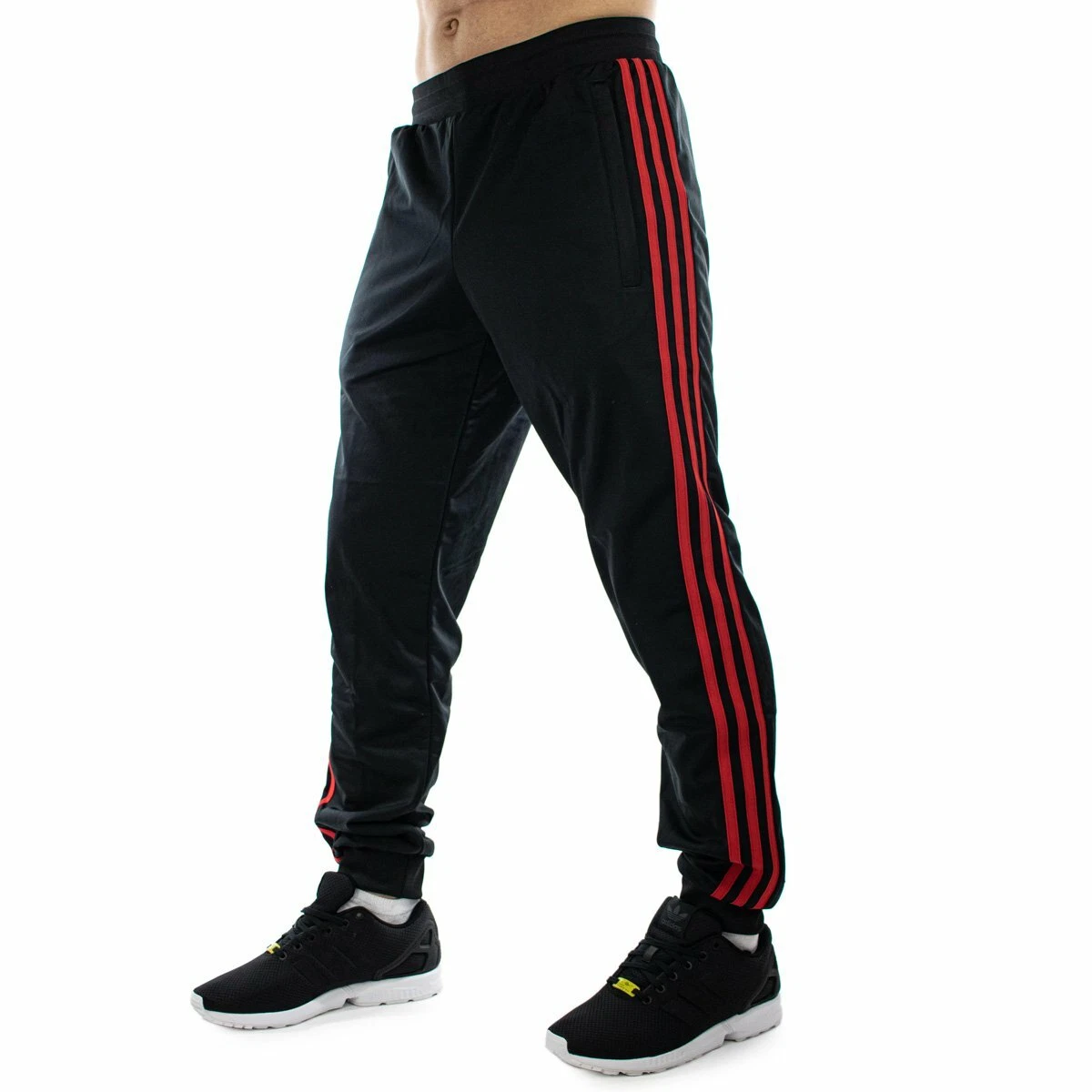 Adidas track pants black with red stripes store