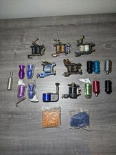 Lot of 7 Tattoo Guns, 11 Grips,  2 Bags of Pin Cushions/Grommets Untested 