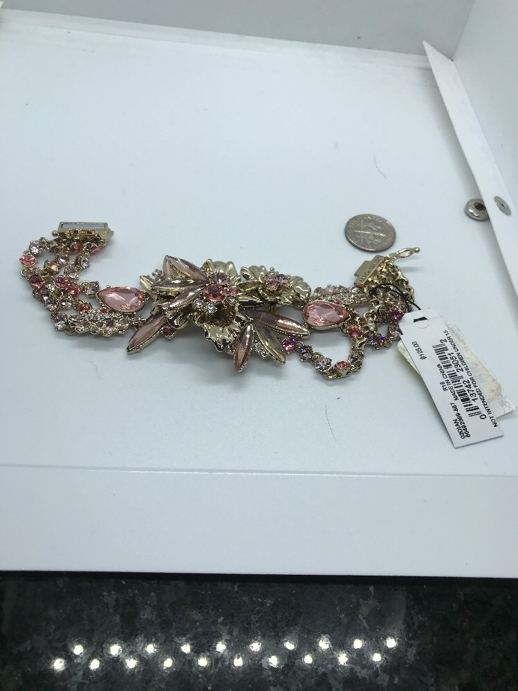 $125 GIVENCHY GOLD TONE MULTI STRAND CRYSTAL STATEMENT