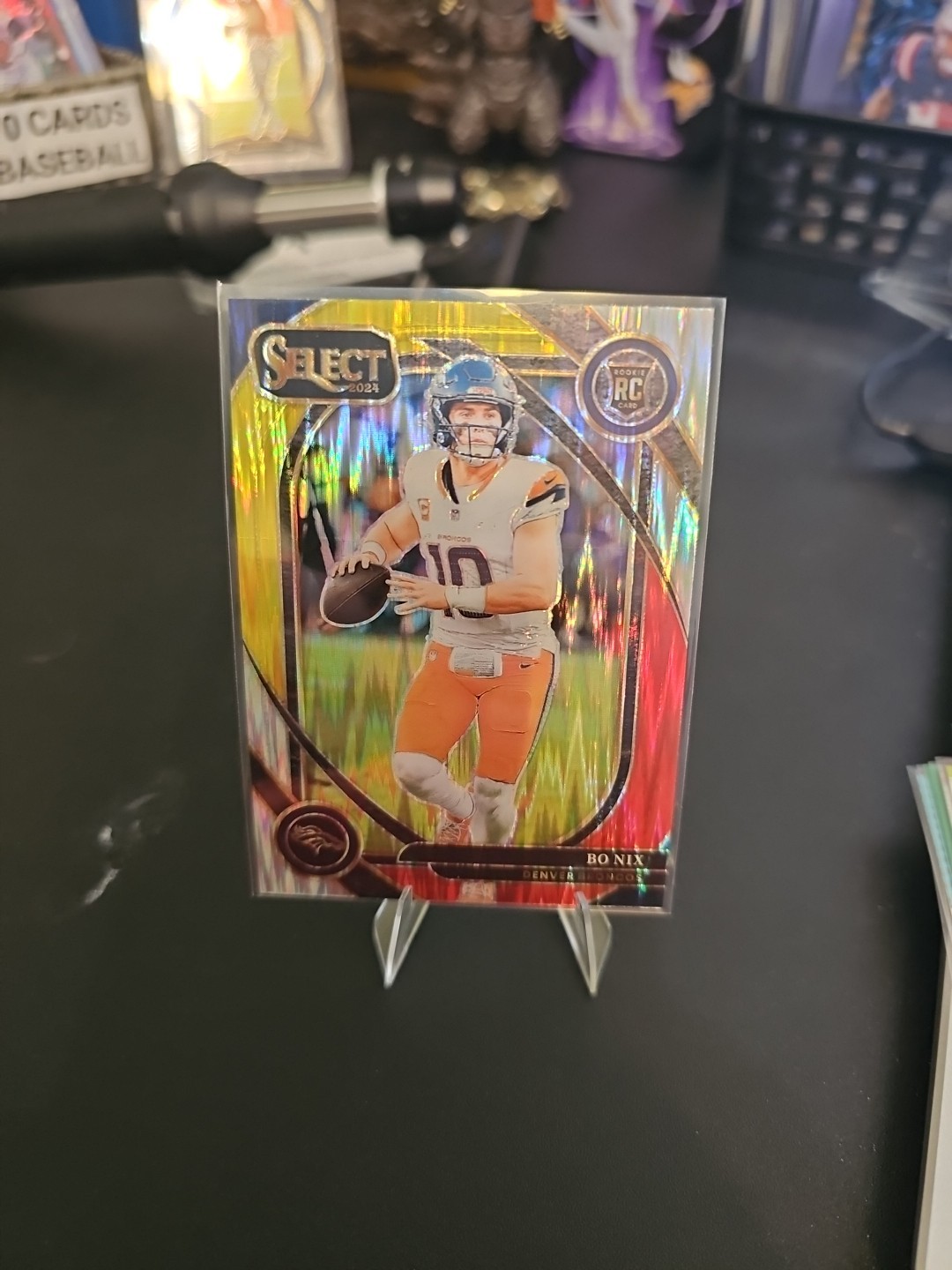 2024 Panini Select - Club Level Bo Nix #221 Red & Yellow Shock Prizm (RC)