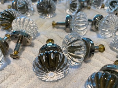 Cabinet knobs/pulls.  1'' in clear glass with chrome base.  Set of 50.