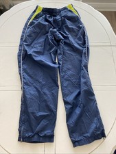 Pantalones de chándal Nike para mujer L azul y lima forro de nailon puños cremallera cortavientos