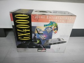 Console GX 4000 - Amstrad GX4000 2 manettes et le jeu d'origine burning rubber H