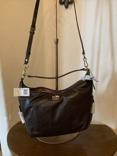 coach studded wristlet