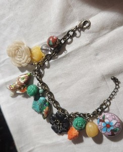 Multi Charm Bracelet w, mixture of great fun charms, 8" Ext. 1" add'l