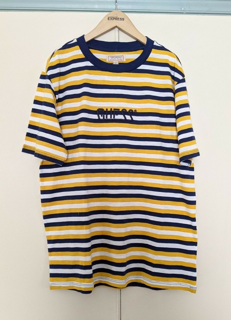 black and yellow guess shirt