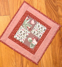 Quilted Patched Table topper, new handmade 12x12, pink with applique flowers