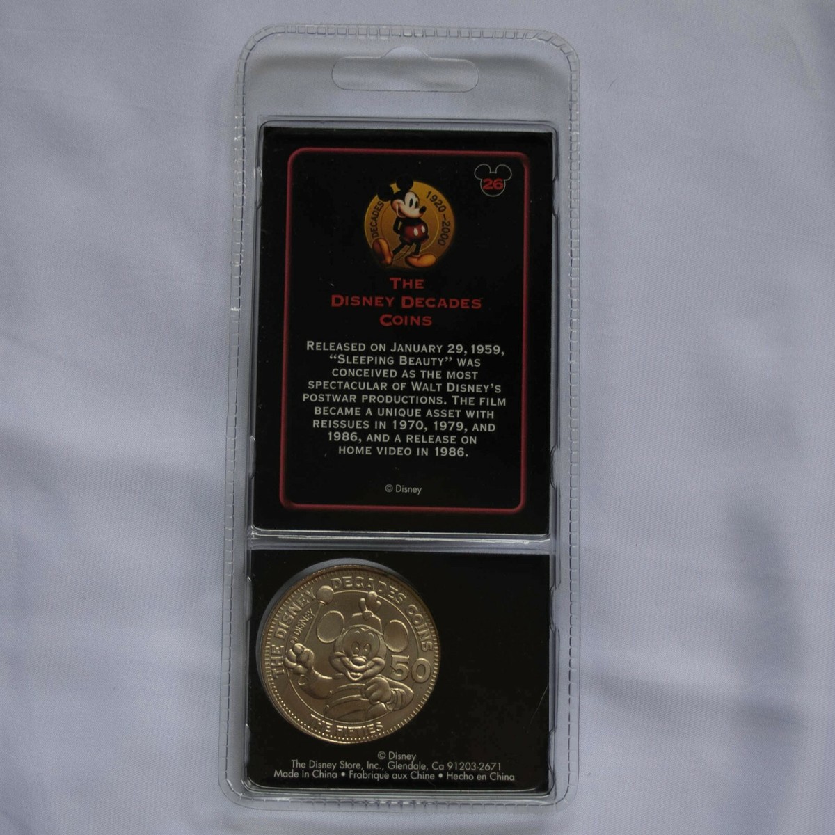 ディズニーコインTHE DISNY DECADES COINS s-l400.jpg