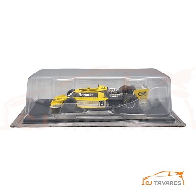 A collectible scale model Renault RS01 from Altaya F1
