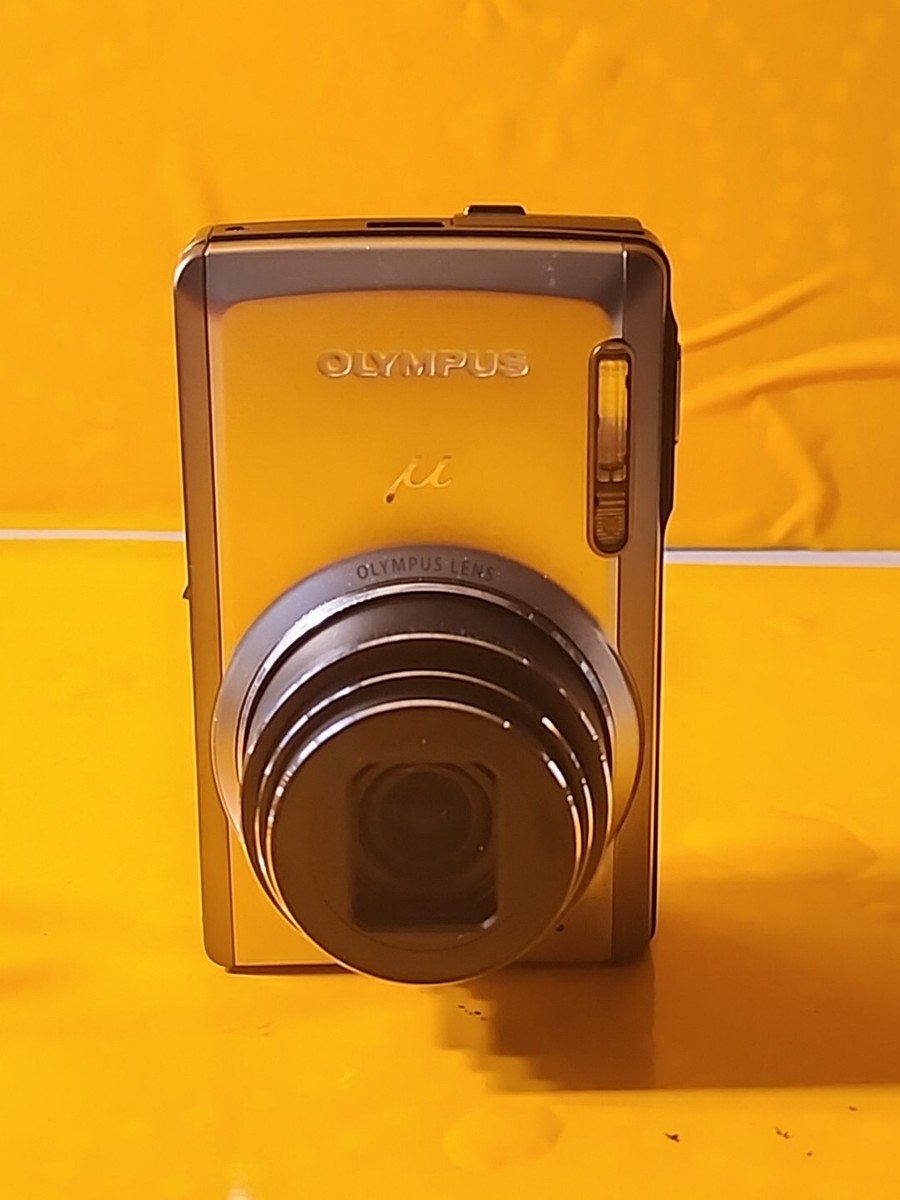 Olympus μ[mju:] 9010 Champagne Gold 14.0 MP Digital Camera READ