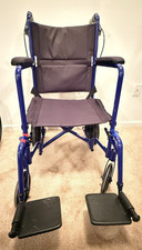 Drive EXP19LT Lightweight Blue Transport Wheelchair Detachable Footrests
