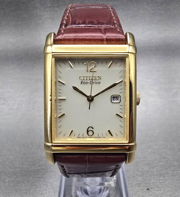 Citizen Eco-Drive Tank Watch Men 25mm Ivory Dial Gold Date E010-S001579 Works