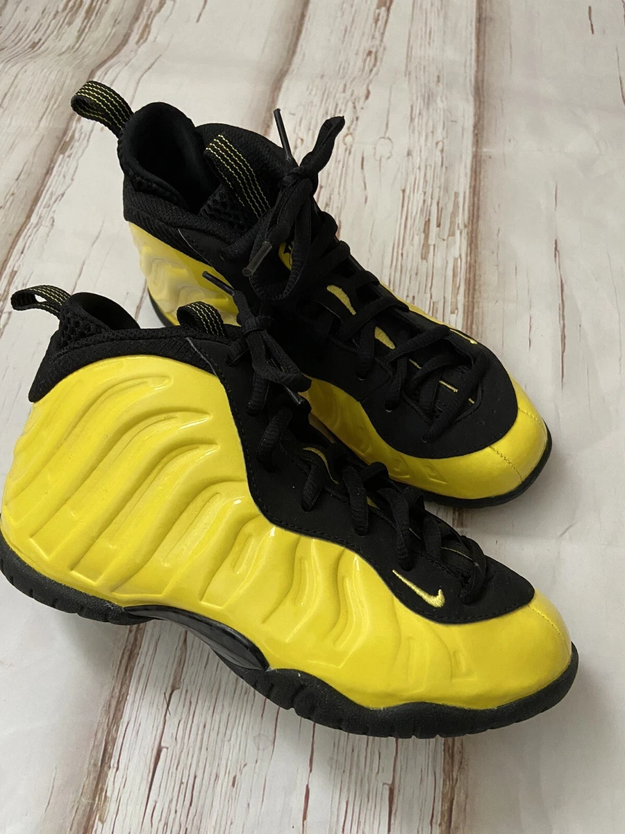 yellow and black infant foamposites