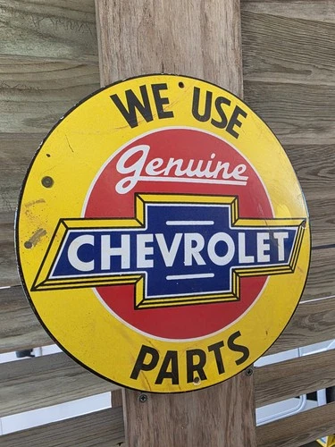 VINTAGE WE USE GENUINE CHEVROLET PARTS  PORCELAIN SIGN 12"