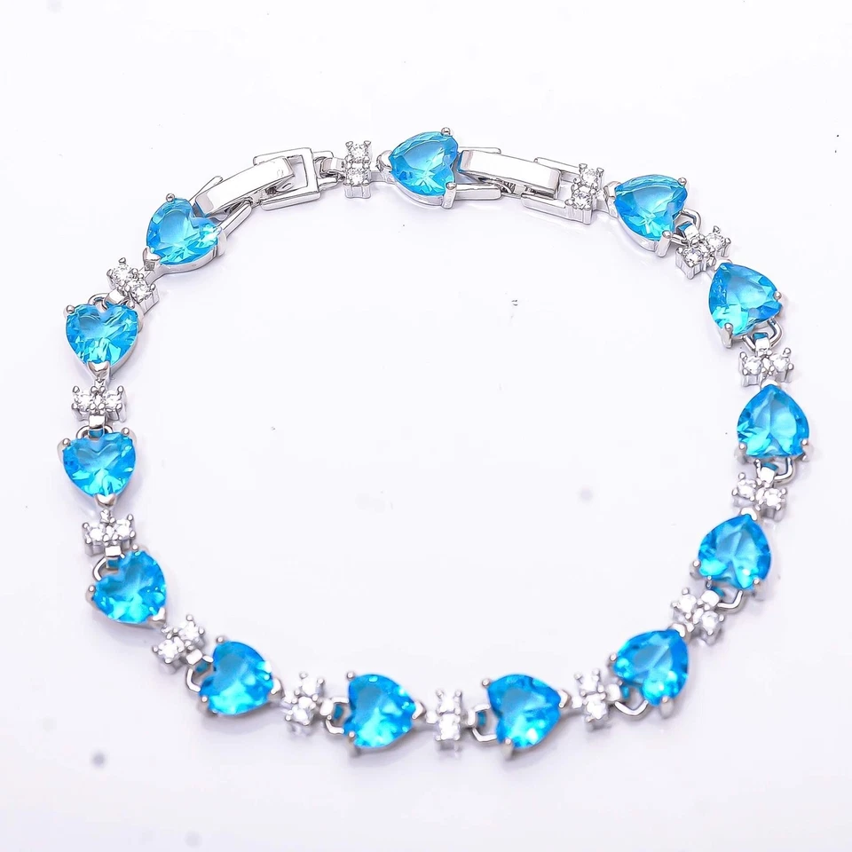 Brazalete Tenis Topacio Azul Simulado Corte Corazón 10 Ct Chapado en Oro Blanco 14K Foto 2 de 4