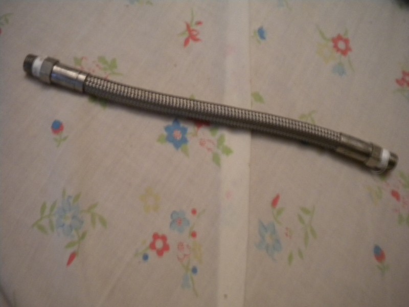 STAINLESS STEEL BRAIDED HOSE 12 1/2 IN.