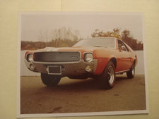 Old photo of a 1969 AMC AMX two door coupe