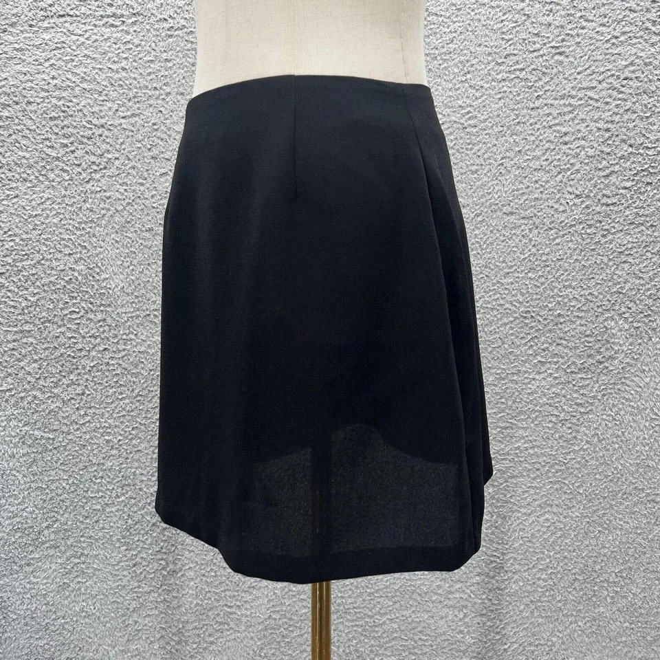 Minifalda subversiva básica negra mínima vintage años 90 oficina siren corp club Foto 2 de 4