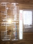 Over 70 Traffic and Railroad signs cast in white plastic, some still in the bag — photo 1