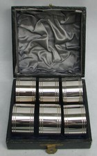 VINTAGE CASE SET 6 MATCHING PLATE NAPKIN RINGS NEW OLD STOCK IN BOX