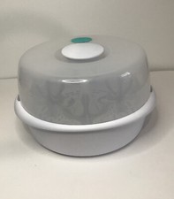 The First Years Microwave Sterilizer Sanitizes Bottles and Breast Pump Parts