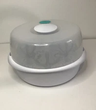 The First Years Microwave Sterilizer Sanitizes Bottles and Breast Pump Parts