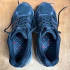 Black and gray New Balance 1540V2 men’s running shoes with silver “Made in USA” label on black insoles, sz 11.5 D.